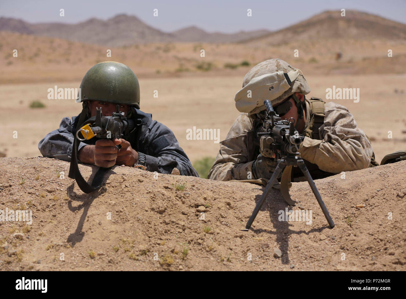 U.S. Marines with Military Police Company Alpha, 4th Law Enforcement Battalion, and the Jordanian 77th Marine Battalion, participate in a Non-Lethal Weapons and Tactics Course during Eager Lion 17, May 11, 2017. Eager Lion is an annual U.S. Central Command exercise in Jordan designed to strengthen military-to-military relationships between the U.S., Jordan and other international partners. This year's iteration is comprised of about 7,400 military personnel from more than 20 nations that will respond to scenarios involving border security, command and control, cyber defense and battlespace man Stock Photo