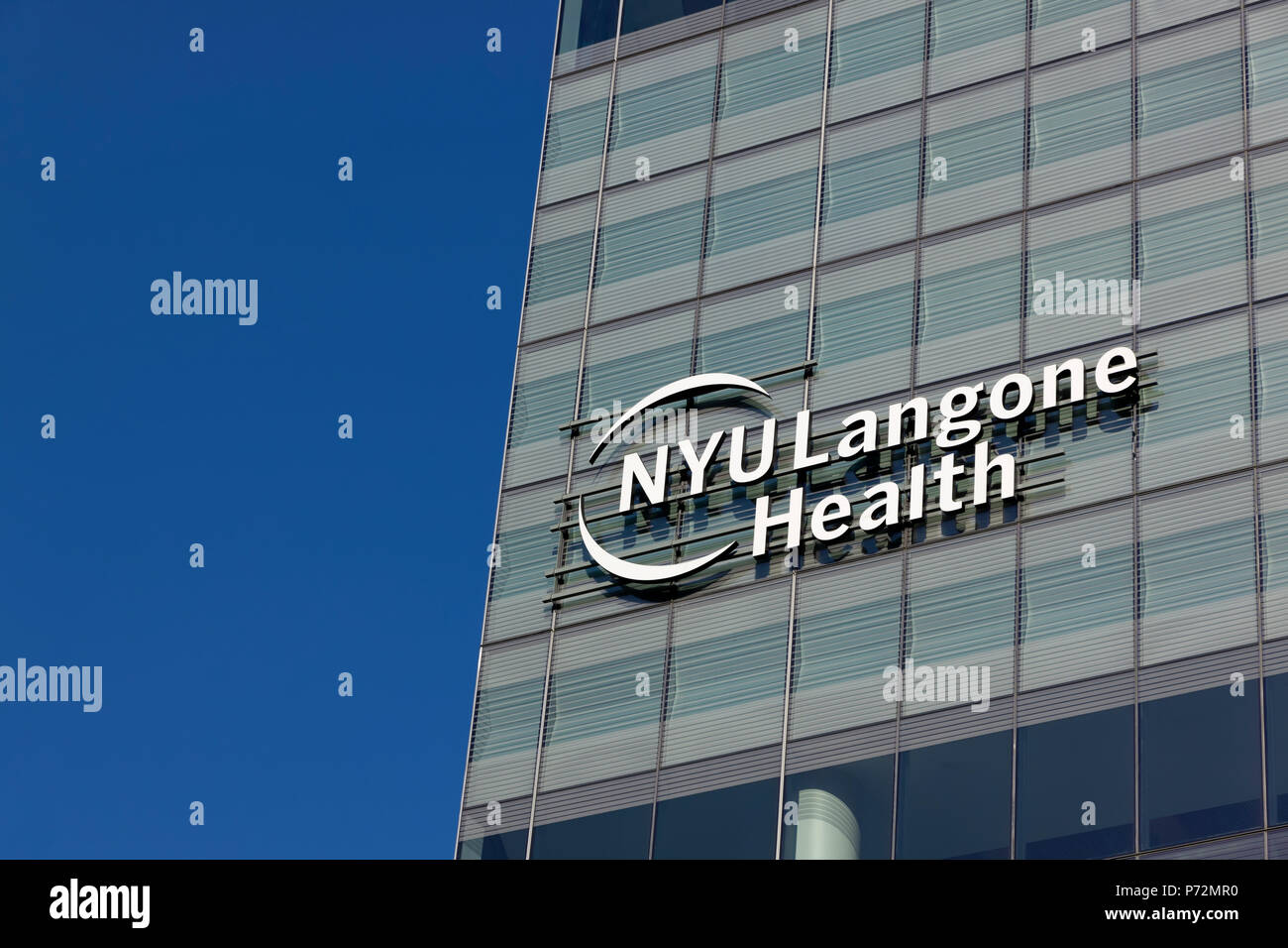 The NYU Langone Health/Hospital Logo on the newly constructed Helen and Martin Kimmel Pavilion Hospital at 424 East 34 Street in New York City. Stock Photo