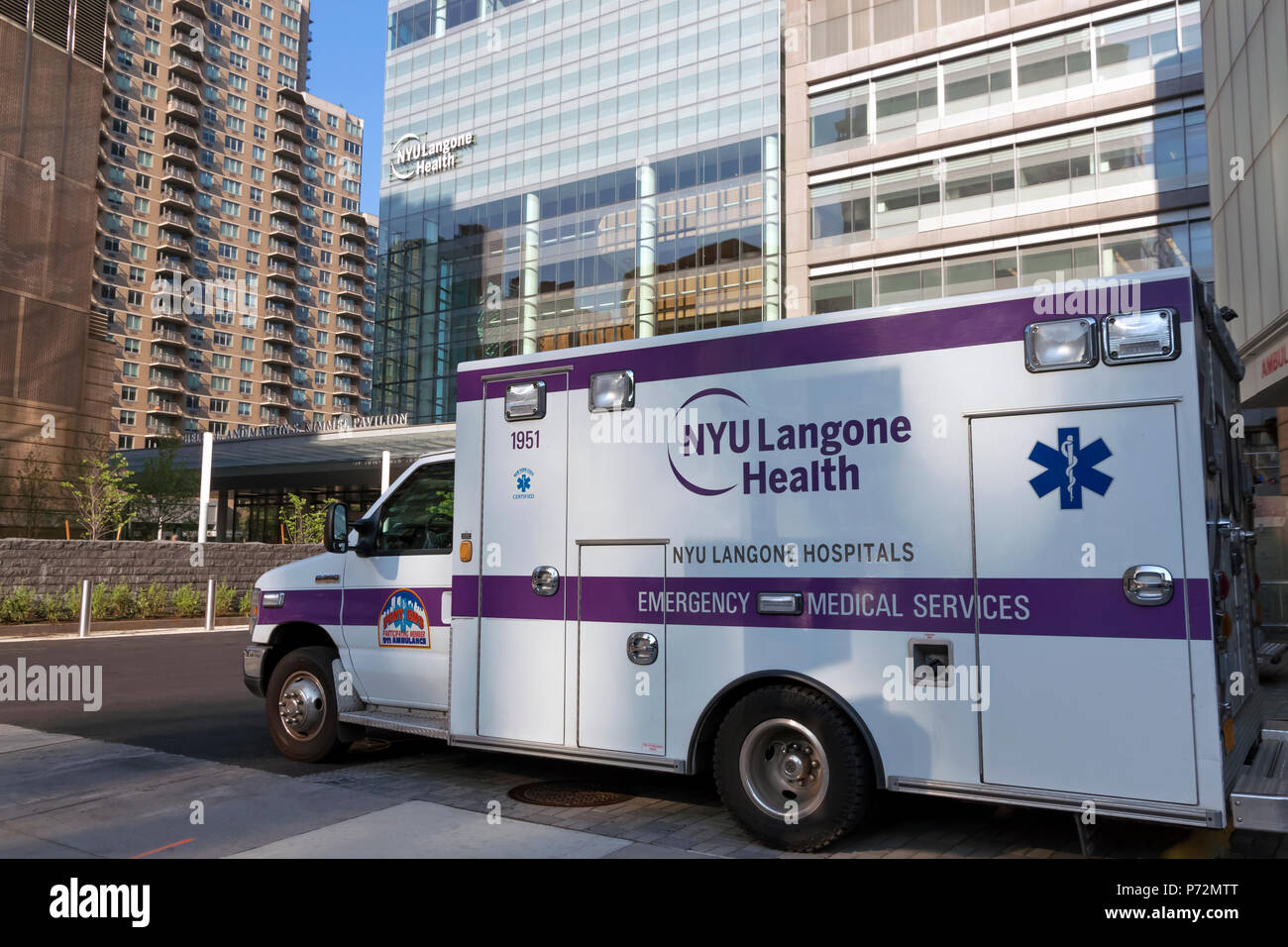 Emergency Medical Services ambulance parked outside of NYU Langone Health Hospital in New York City. Stock Photo