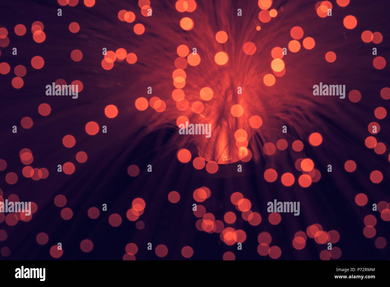 blurred glowing red fiber optics texture Stock Photo - Alamy