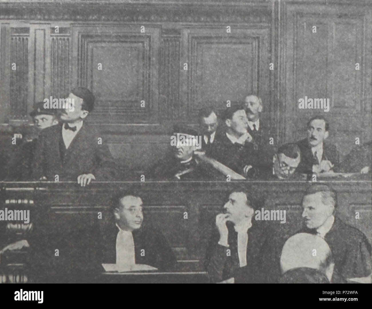 English: The Schwartzbard court trial Paris Oct 1927. Sholom Schwartzbard speech in the court. Below him, Henri Torrès, his attorney. Context: Sholom Schwartzbard assassinated Symon Petliura on May 25, 1926. He fully admitted to the crime. The trial turned on accusations of Petlura's responsibility for the 1919–1920 pogroms in Ukraine, during which Schwartzbard had lost all 15 members of his family. Schwartzbard was acquitted. Українська: Судовий процес Самуїла Шварцбарда Париж, жовтень 1927. Шварцбард, виступає у суді, під ним на світлині Анрі Торрес, його захисник. Контекст: Самуїл Шварцбард Stock Photo