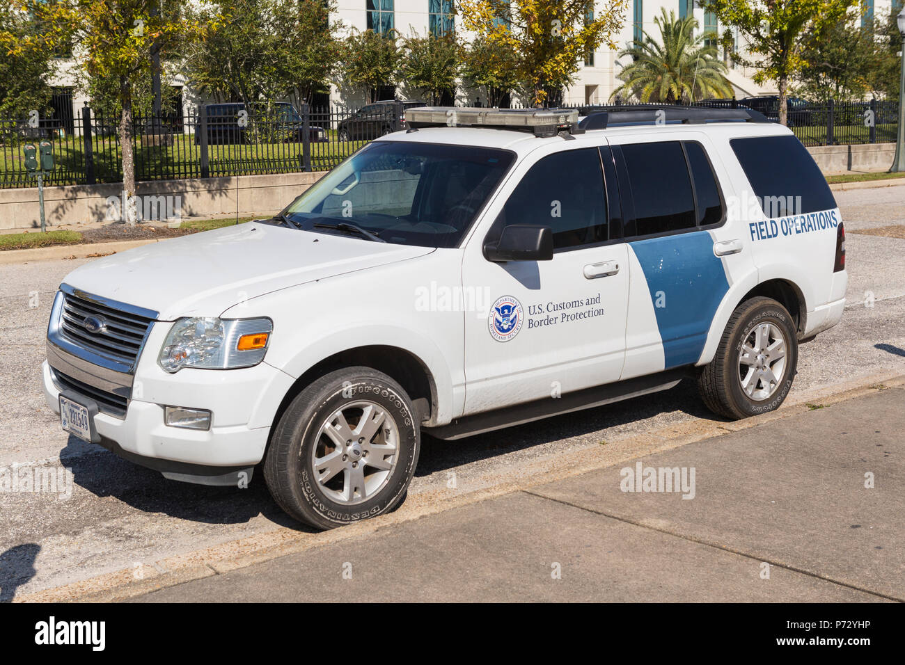 A U.S. Customs and Border Protection Field Operations vehicle parked in front of the Mobile Service Port office in Mobile, Alabama. Stock Photo