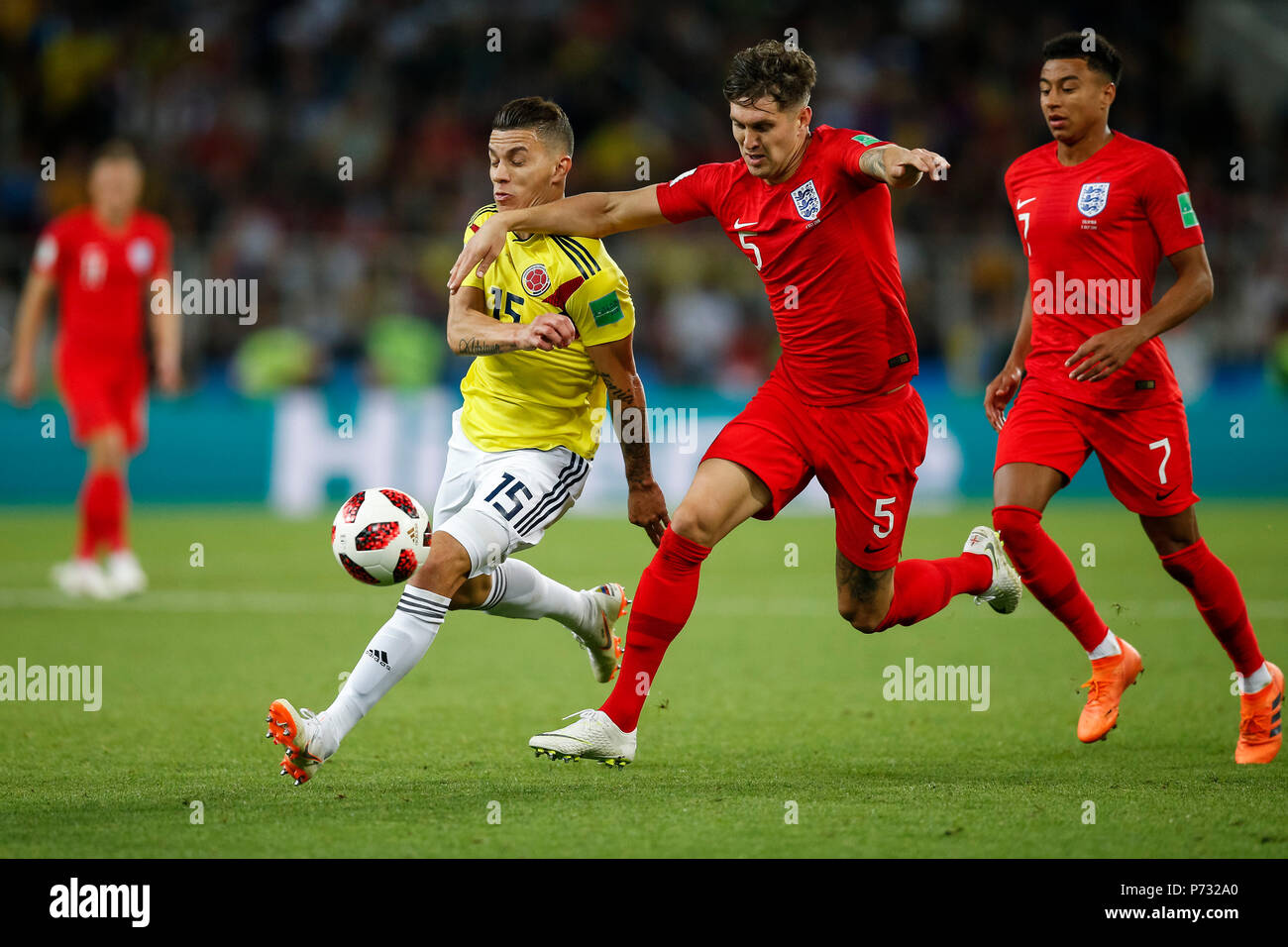 Moscow, Russia. 3rd July, 2018. Mateus Uribe of Colombia and John Stones of England during the 2018 FIFA World Cup Round of 16 match between Colombia and England at Spartak Stadium on July 3rd 2018 in Moscow, Russia.Credit: PHC Images/Alamy Live News Stock Photo