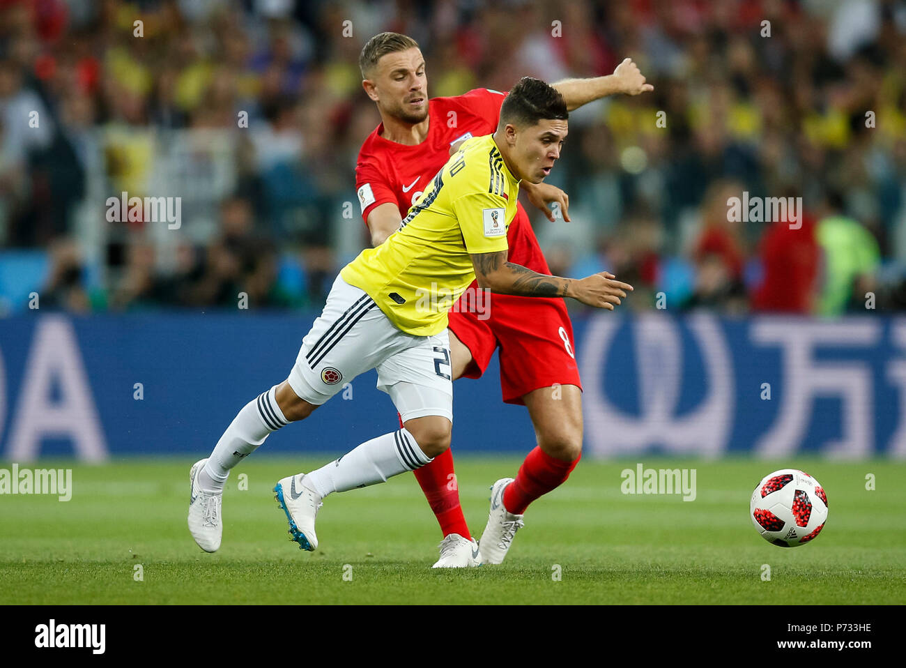 Moscow, Russia. 3rd July, 2018. Juan Quintero of Colombia and Jordan Henderson of England during the 2018 FIFA World Cup Round of 16 match between Colombia and England at Spartak Stadium on July 3rd 2018 in Moscow, Russia.Credit: PHC Images/Alamy Live News Stock Photo