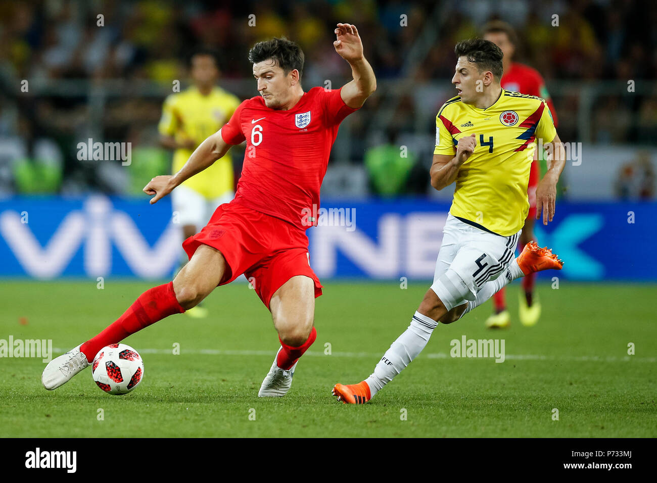 Moscow, Russia. 3rd July, 2018. Harry Maguire of England and Santiago Arias of Colombia during the 2018 FIFA World Cup Round of 16 match between Colombia and England at Spartak Stadium on July 3rd 2018 in Moscow, Russia.Credit: PHC Images/Alamy Live News Stock Photo