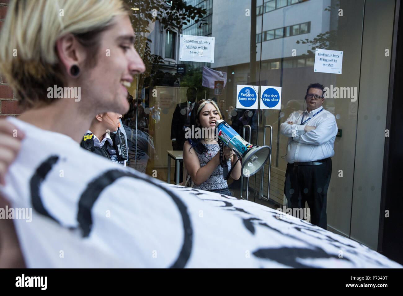 London, UK. 3rd July, 2018. Sahaya James, Campaigns Officer at Arts SU and National Campaign Against Fees and Cuts national committee member, addresses campaigners against social cleansing, including students from UAL, protesting outside the offices of Southwark Council on the occasion of a vote by Southwark Council Planning Committee on the Delancey UAL development plan. Credit: Mark Kerrison/Alamy Live News Stock Photo