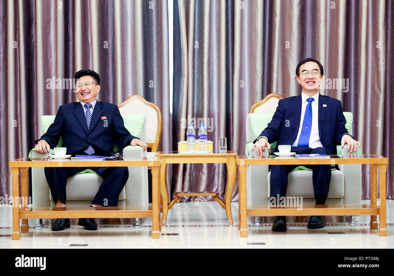 Cho Myoung-Gyon and Won Kil-U, July 3, 2018 : North Korea's Vice Sports Minister Won Kil-U (L) and South Korean Unification Minister Cho Myoung-Gyon talk upon the latter's arrival at the Pyongyang Sunan International Airport in Pyongyang, North Korea. The 100-strong South Korean delegation of athletes, coaches, government officials and journalists arrived in Pyongyang on Tuesday. South and North Korea plan to hold four inter-Korean friendly basketball matches in Pyongyang on Wednesday and Thursday. The inter-Korean basketball matches will be held for the first time in 15 years. EDITORIAL USE O Stock Photo