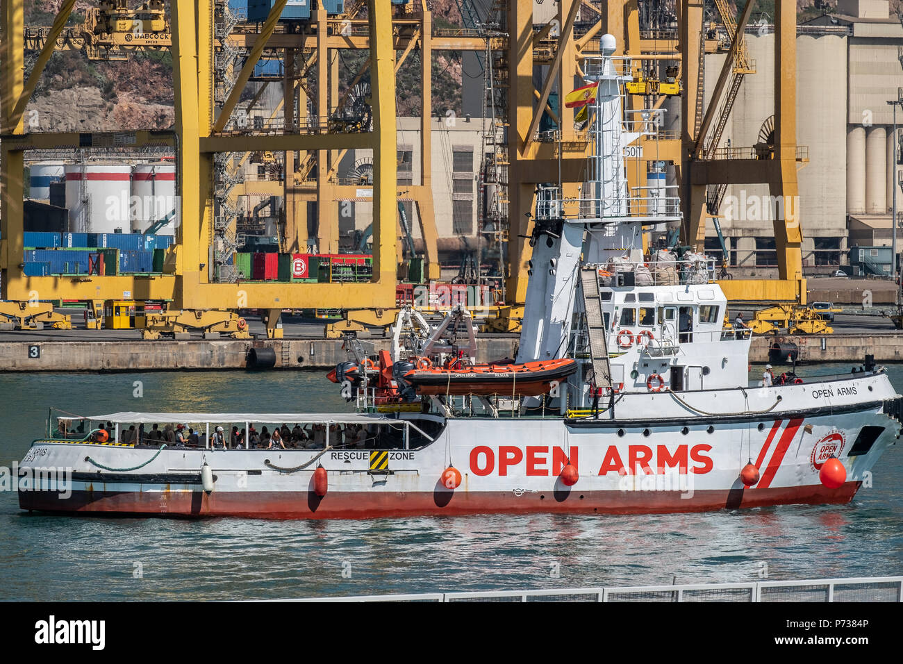 The rescue boat Proactiva Open Arms has docked in Barcelona with 60 people rescued in the Mediterranean off the coast of Libya. Barcelona has offered itself as a refuge city after Italy's refusal to continue hosting more rescues carried out by NGOs. Stock Photo