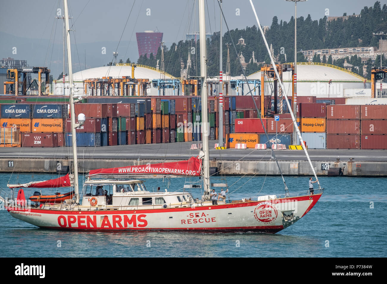 The rescue sailing boat Proactiva Open Arms has docked in Barcelona with 60 people rescued in the Mediterranean off the coast of Libya. Barcelona has offered itself as a refuge city after Italy's refusal to continue hosting more rescues carried out by NGOs. Stock Photo