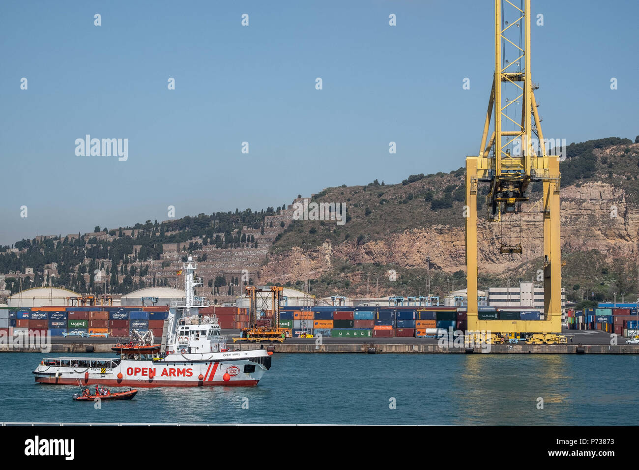 Barcelona, Catalonia, Spain. 4th July, 2018. The rescue boat Proactiva Open Arms has docked in Barcelona with 60 people rescued in the Mediterranean off the coast of Libya. Barcelona has offered itself as a refuge city after Italy's refusal to continue hosting more rescues carried out by NGOs. Credit: Paco Freire/SOPA Images/ZUMA Wire/Alamy Live News Stock Photo