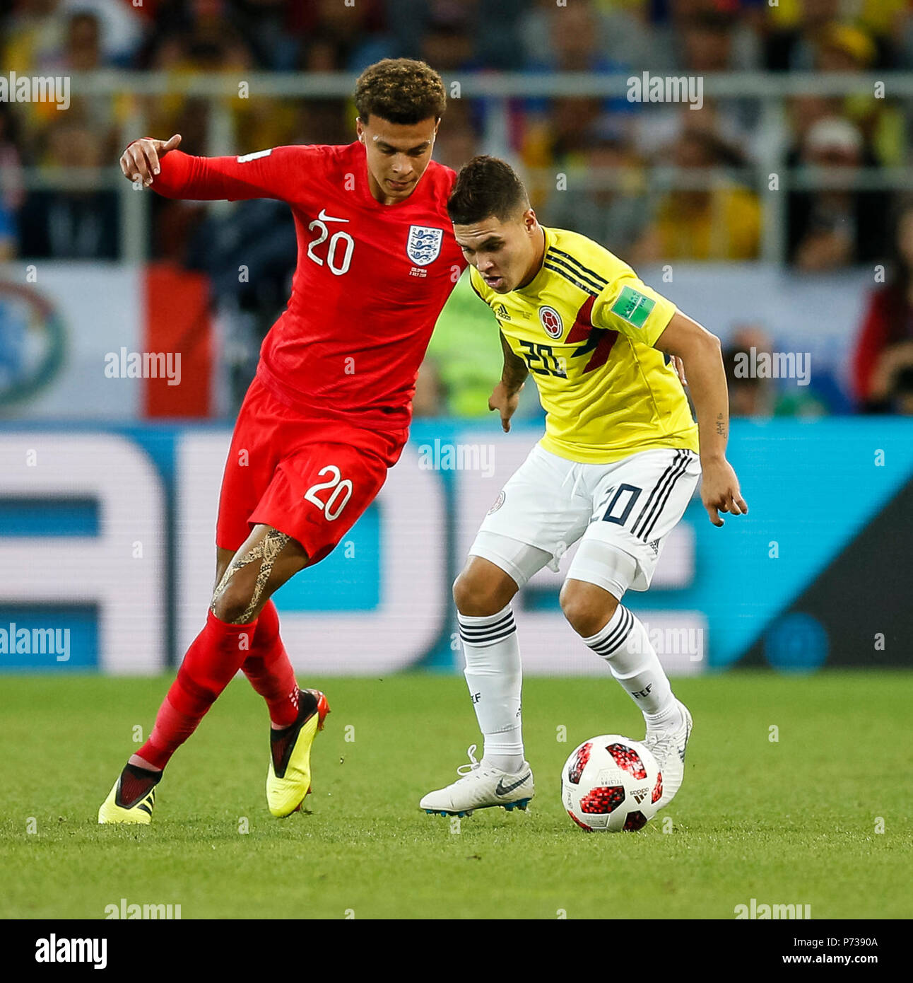Moscow, Russia. 3th July 2018. Dele Alli of England and Juan Quintero of Colombia during the 2018 FIFA World Cup Round of 16 match between Colombia and England at Spartak Stadium on July 3rd 2018 in Moscow, Russia. Credit: PHC Images/Alamy Live News Stock Photo