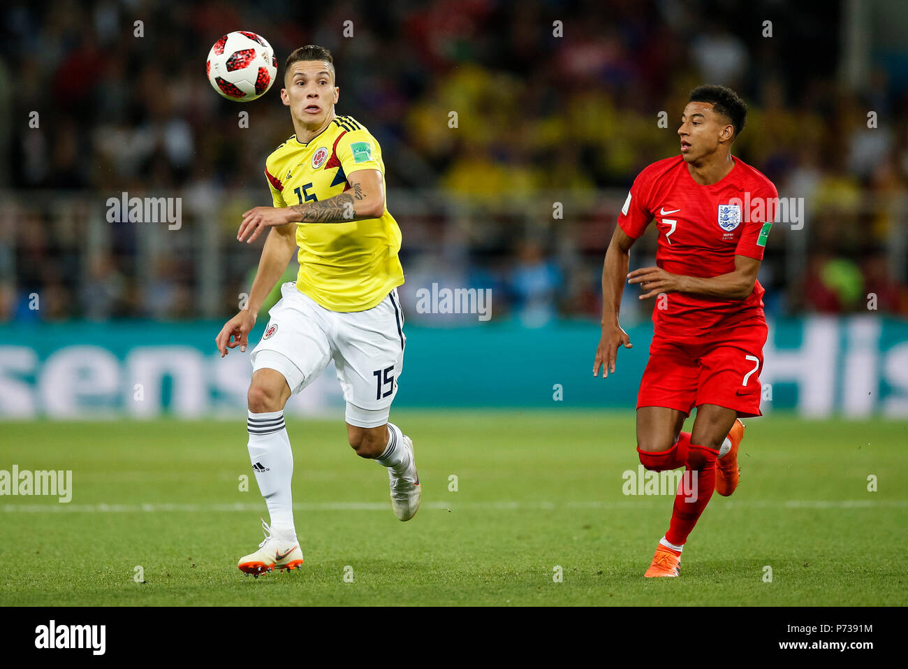 Moscow, Russia. 3th July 2018. Mateus Uribe of Colombia and Jesse Lingard of England during the 2018 FIFA World Cup Round of 16 match between Colombia and England at Spartak Stadium on July 3rd 2018 in Moscow, Russia. Credit: PHC Images/Alamy Live News Stock Photo