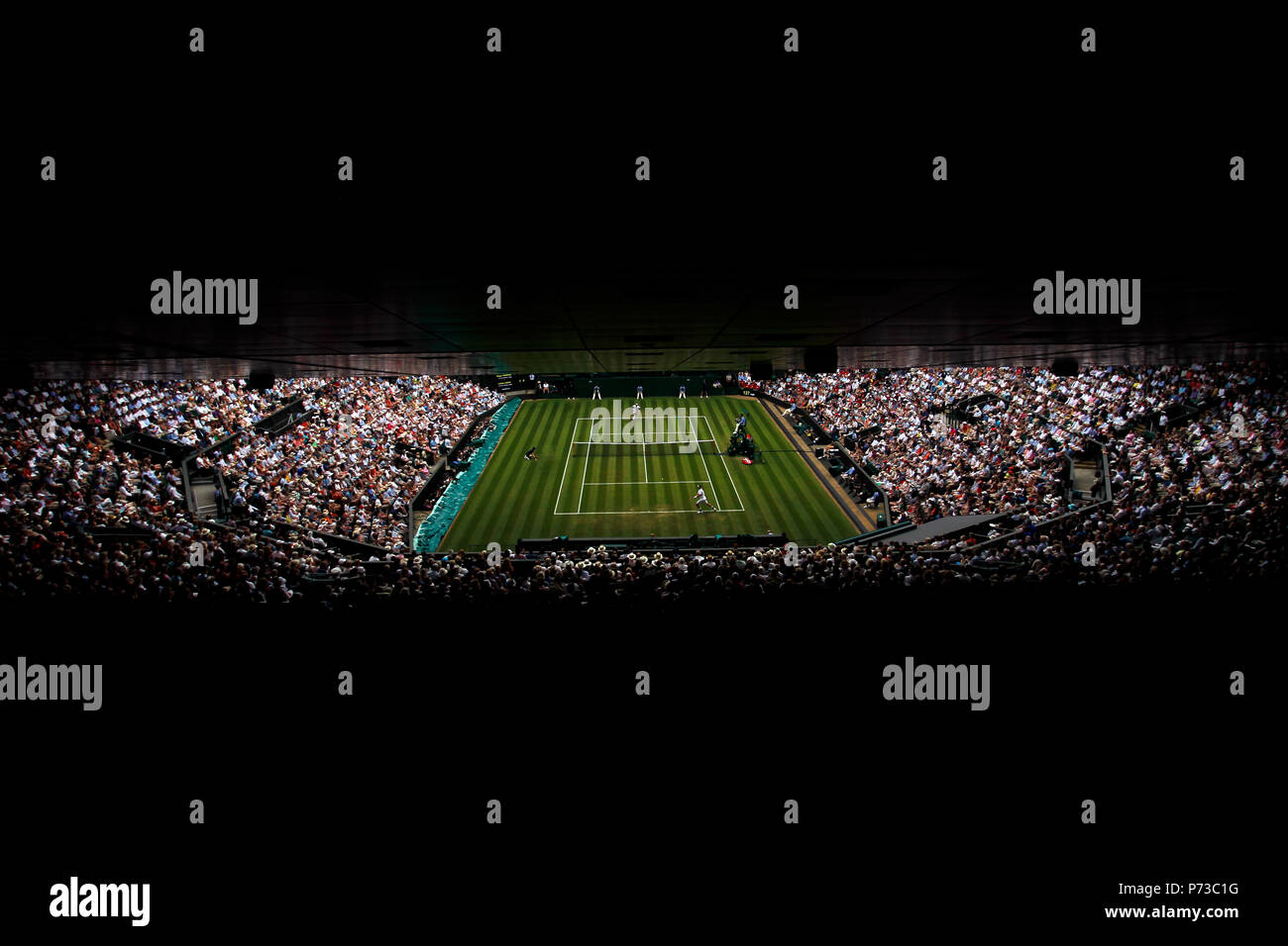 London, England - July 4th, 2018.  Wimbledon Tennis:  General view of Centre Court during Roger Federer's second round match against Lukas Lacko of Slovakia today at Wimbledon Credit: Adam Stoltman/Alamy Live News Stock Photo