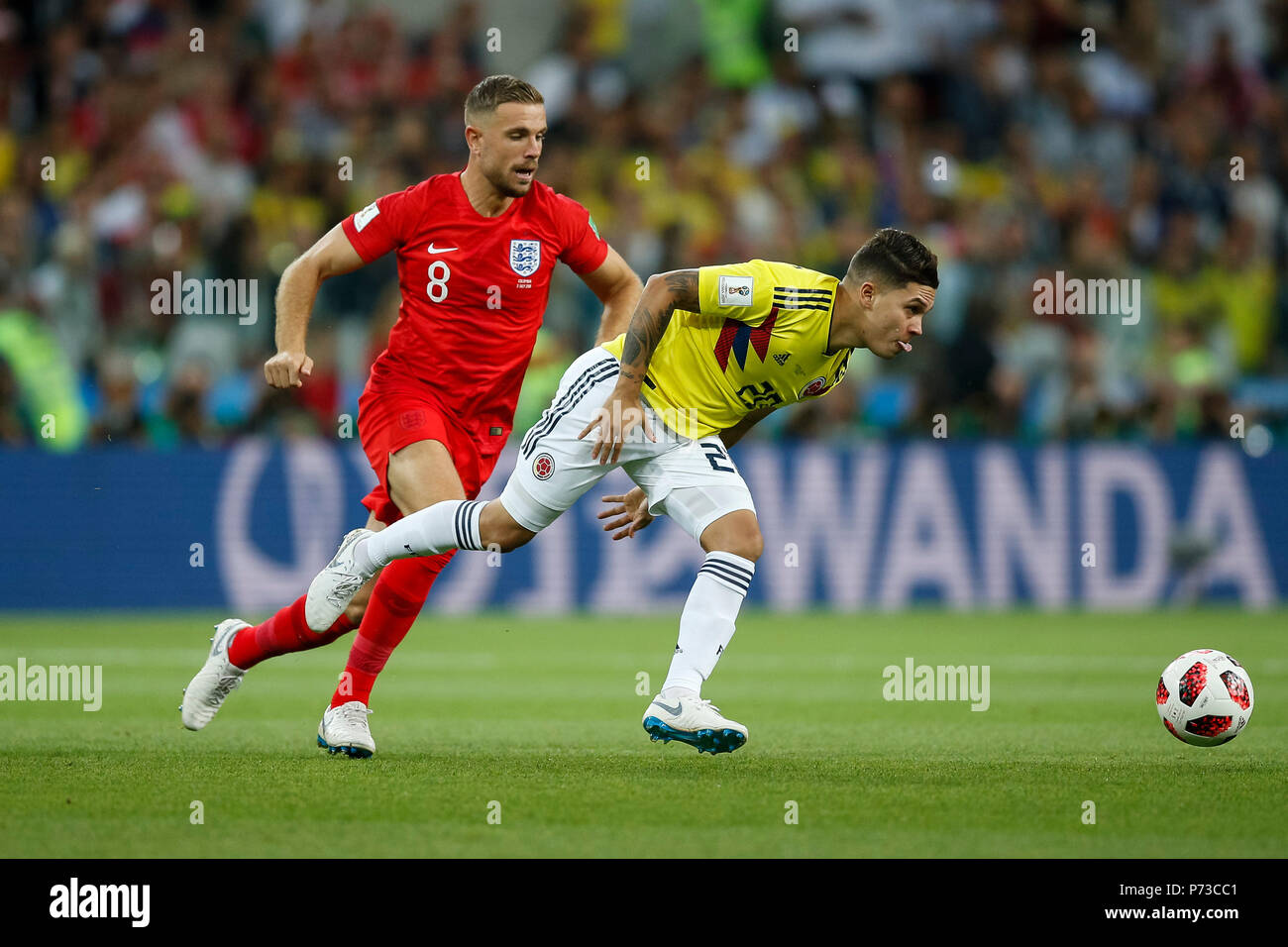 Moscow, Russia. 3rd July 2018. Jordan Henderson of England and Juan Quintero of Colombia during the 2018 FIFA World Cup Round of 16 match between Colombia and England at Spartak Stadium on July 3rd 2018 in Moscow, Russia. Credit: PHC Images/Alamy Live News Stock Photo