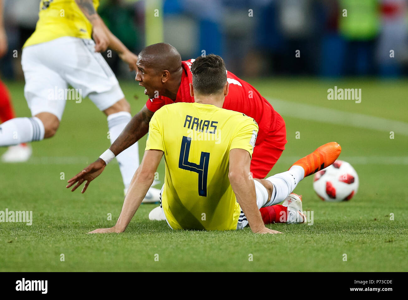 Moscow, Russia. 3rd July 2018. Ashley Young of England is tackled by Santiago Arias of Colombia during the 2018 FIFA World Cup Round of 16 match between Colombia and England at Spartak Stadium on July 3rd 2018 in Moscow, Russia. Credit: PHC Images/Alamy Live News Stock Photo