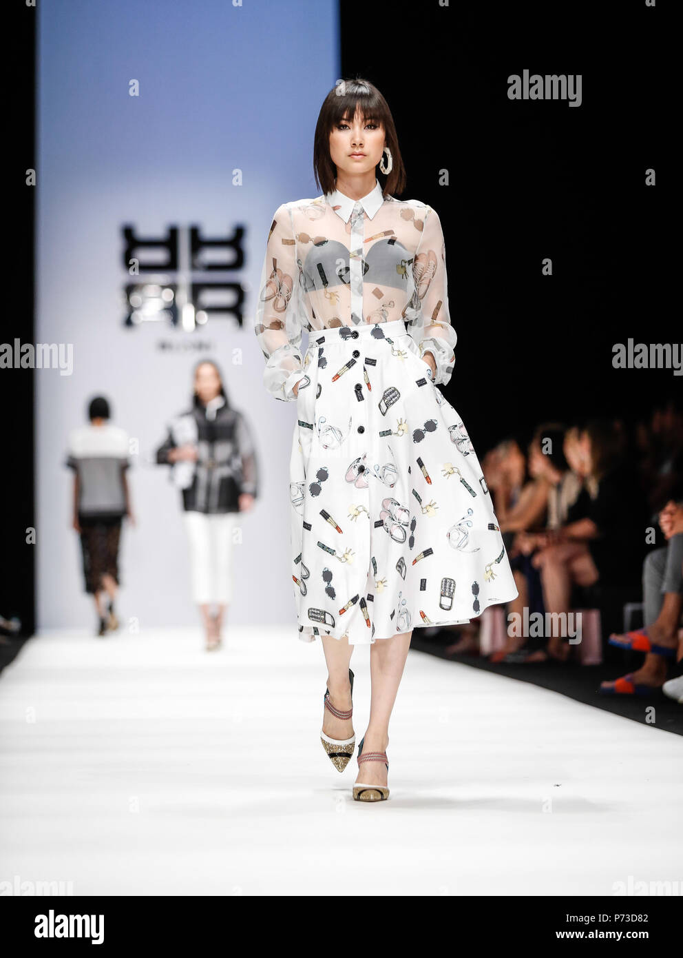 Berlin, Germany - July 4, 2018: Models presents a Spring/Summer 2019 Riani collection during the second day of MBFW Berlin Fashion Weak in the ewerk showspace in Berlin Stock Photo