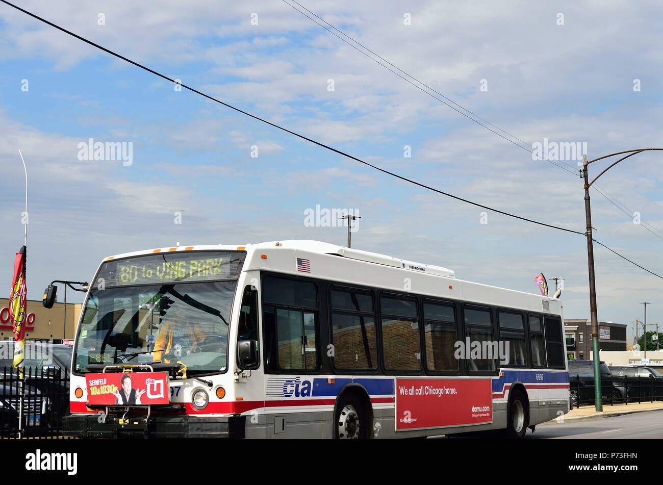 Chicago, Illinois, USA. A Chicago Transit Authority (CTA) bus on Irving ...