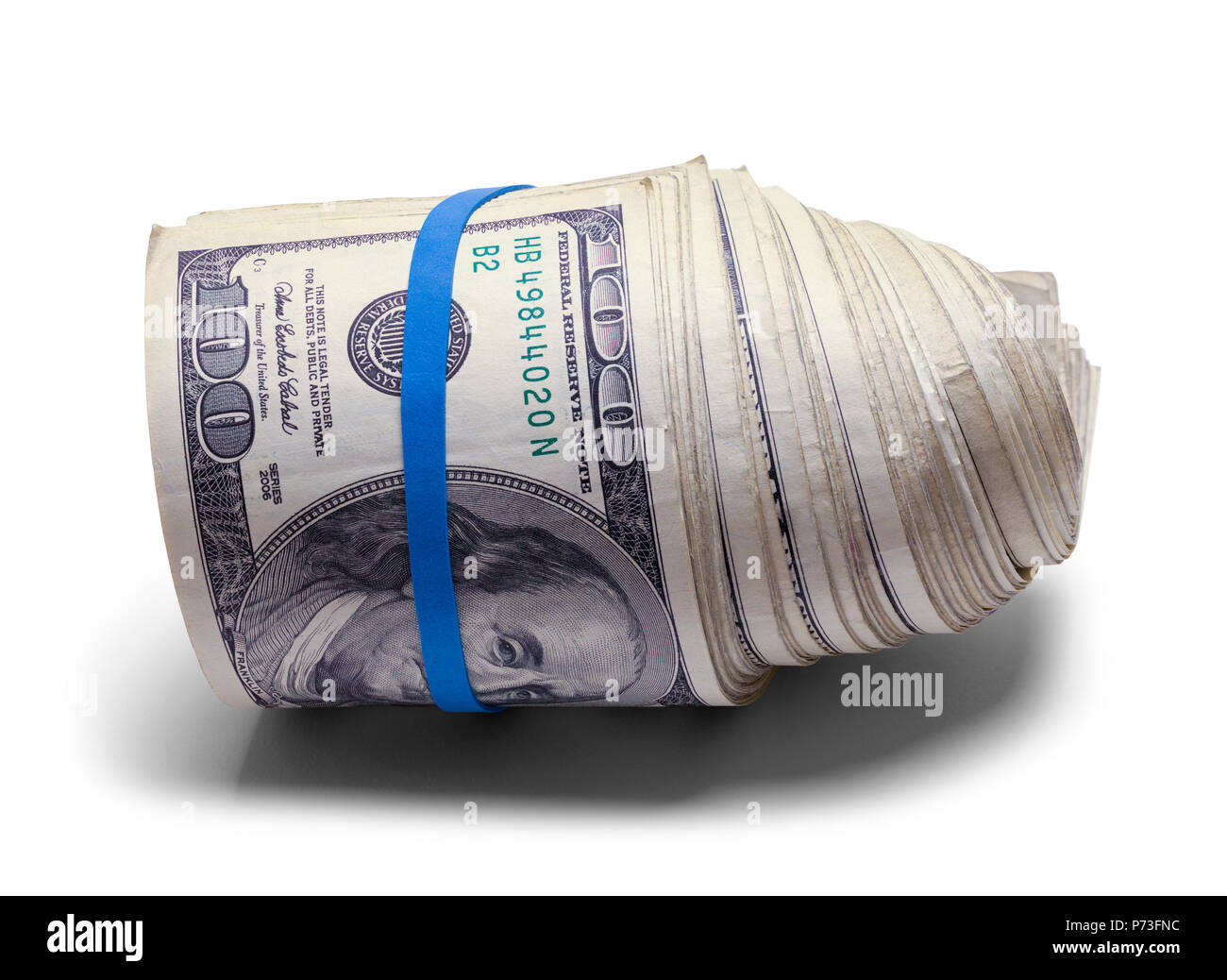 Large Spiral Roll of One Hundred Dollar Bills Isolated on White. Stock Photo