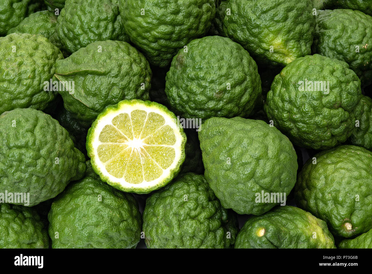Kaffir limes, one cut citrus, ingredient for health and beauty products Stock Photo