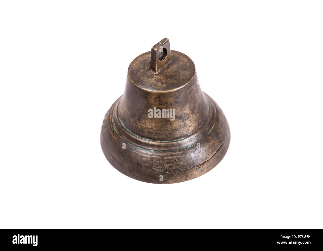 Antique copper small bell on white background Stock Photo by