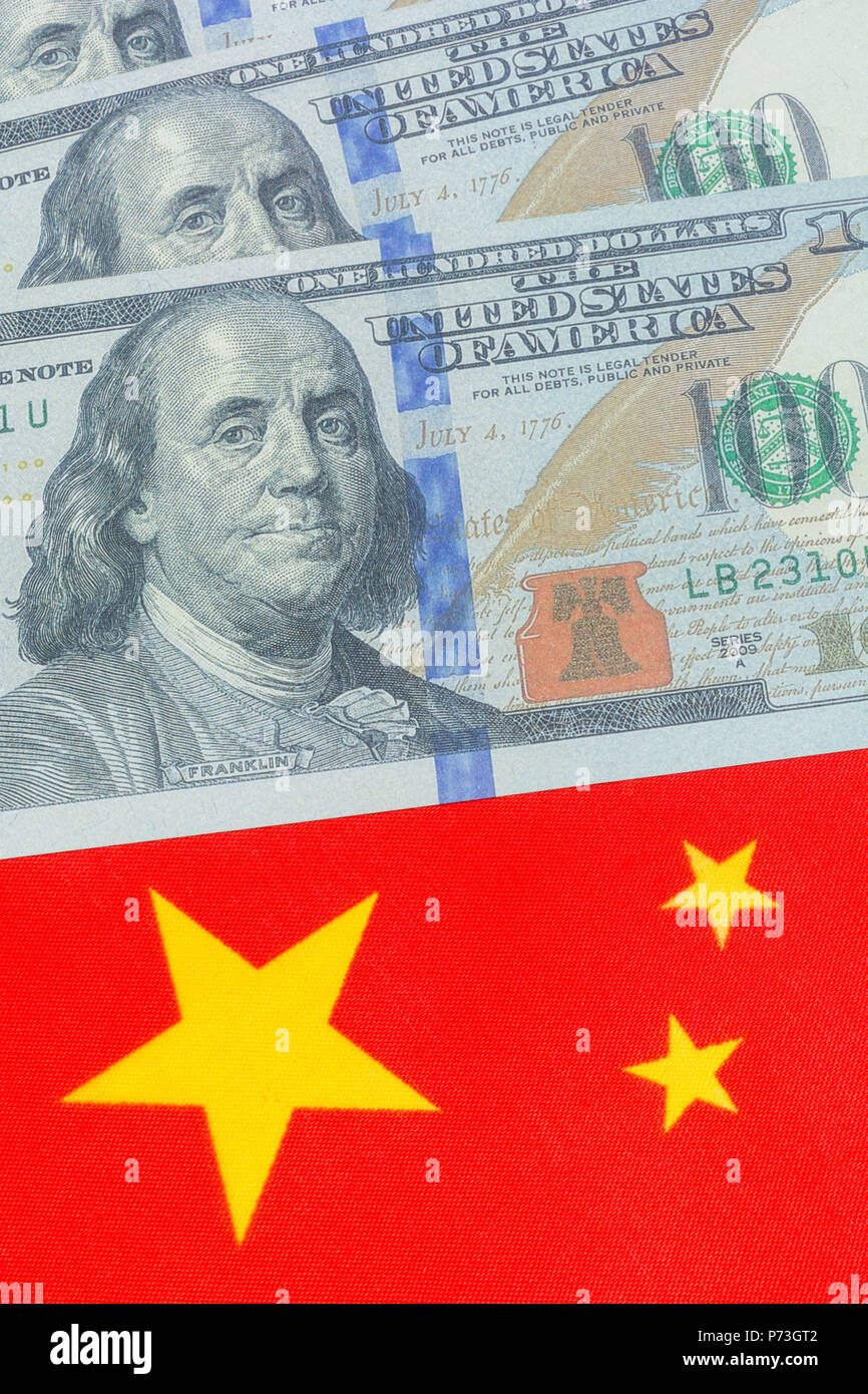 Chinese flag + US Dollar bills / Banknotes. For USChina trade war
