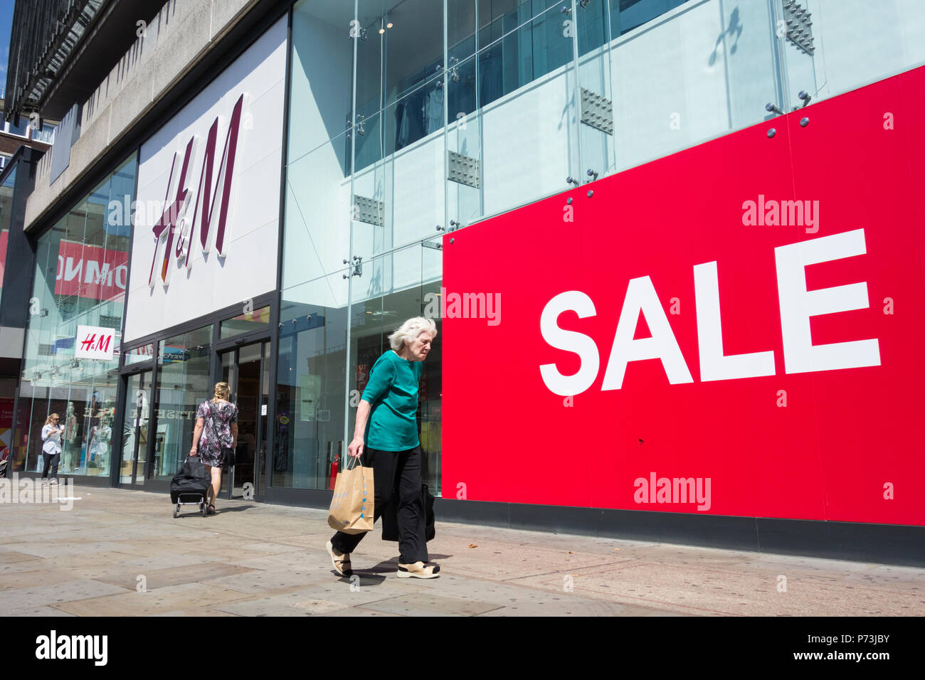 A sale poster outside H&M, Kings Mall Shopping Centre, Hammersmith, King  Street, London, W8 Stock Photo - Alamy