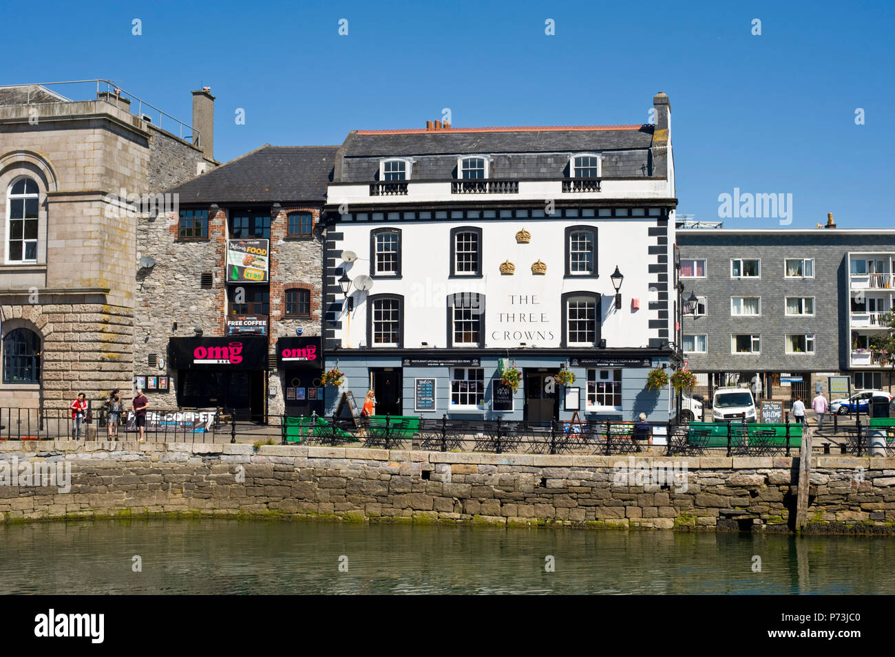 The Three Crowns pub and OMG bar harbourside at The Barbican Plymouth Devon England UK Stock Photo