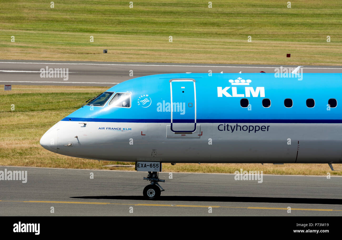 KLM Cityhopper Embraer 190 taxiing for take off at Birmingham Airport, UK (PH-EXA) Stock Photo