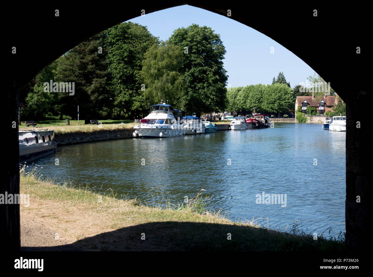 View of the River Thames from under Abingdon Bridge pathway, Abingdon-on-Thames, Oxfordshire, England, UK Stock Photo