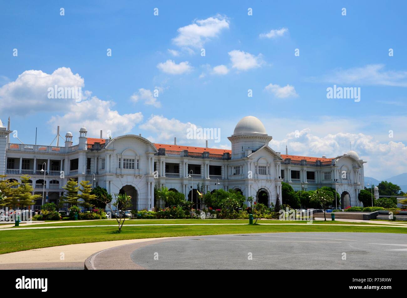 KTM Malaysian railway colonial train station building with gardens Ipoh Malaysia Stock Photo