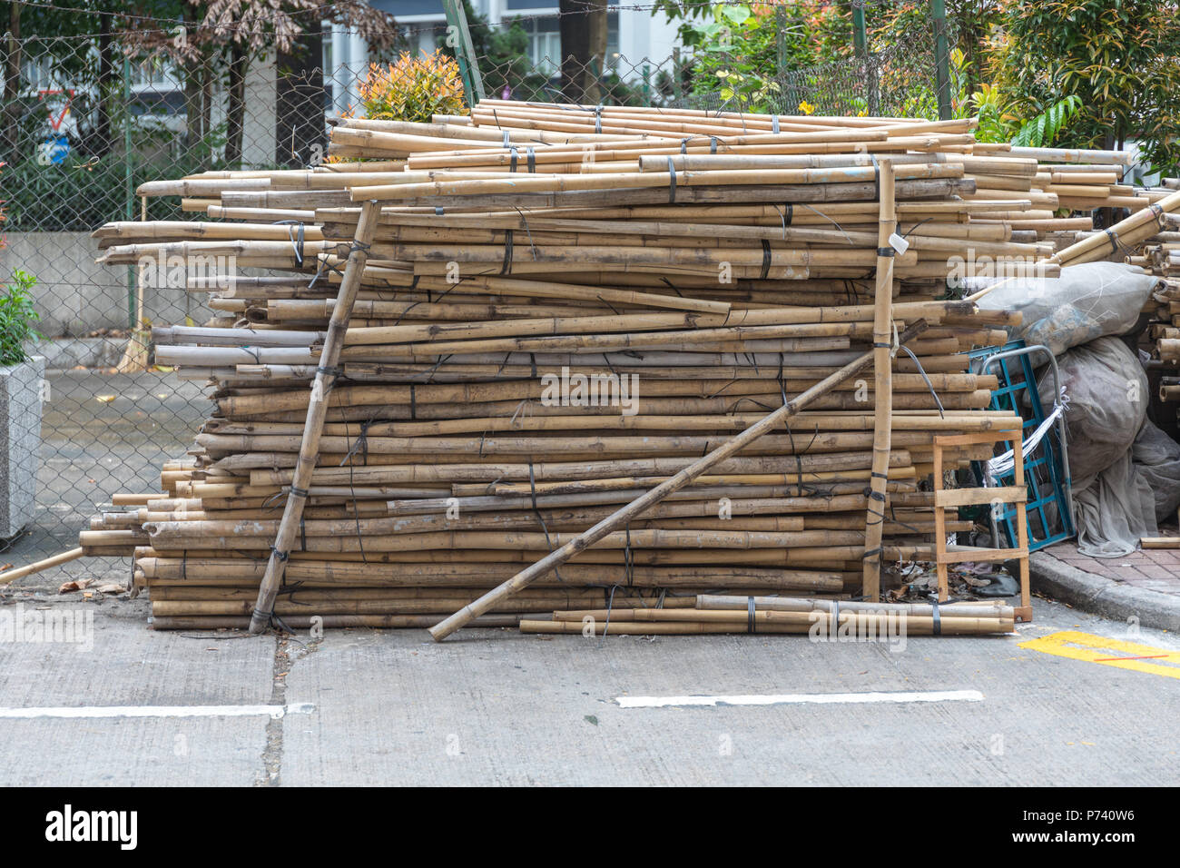 Big Stacks of Bamboo Sticks Poles at Construction Site Stock Photo Alamy