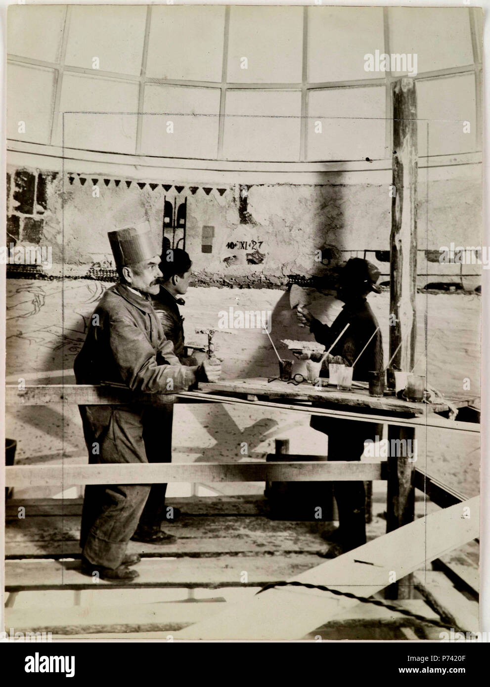 Akseli and Jorma Gallen-Kallela with an unknown mason making the Kalevala cupola frescoes in the National Museum of Finland, 1928 Stock Photo