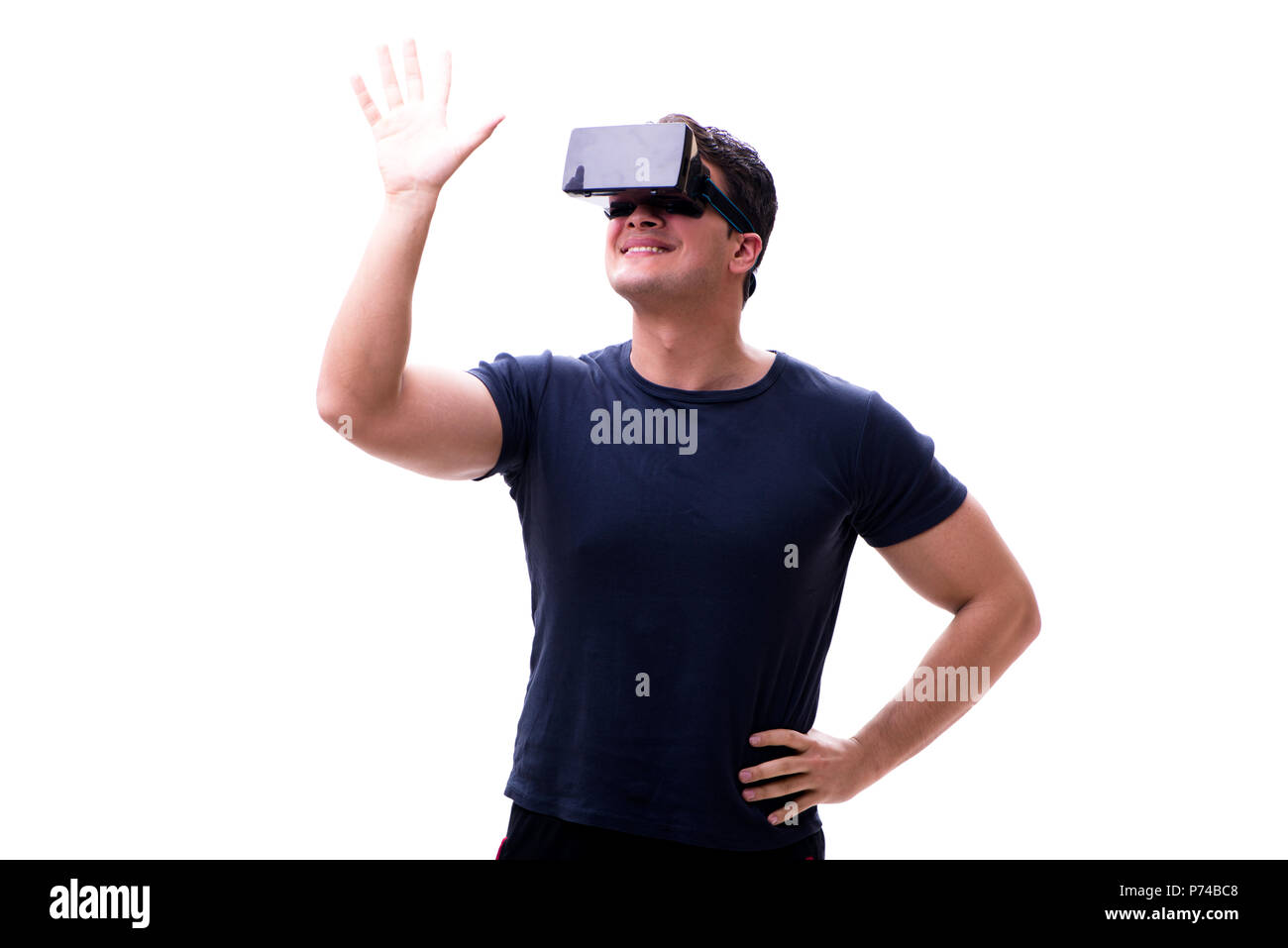 Man playing with virtual reality glasses on white background Stock Photo