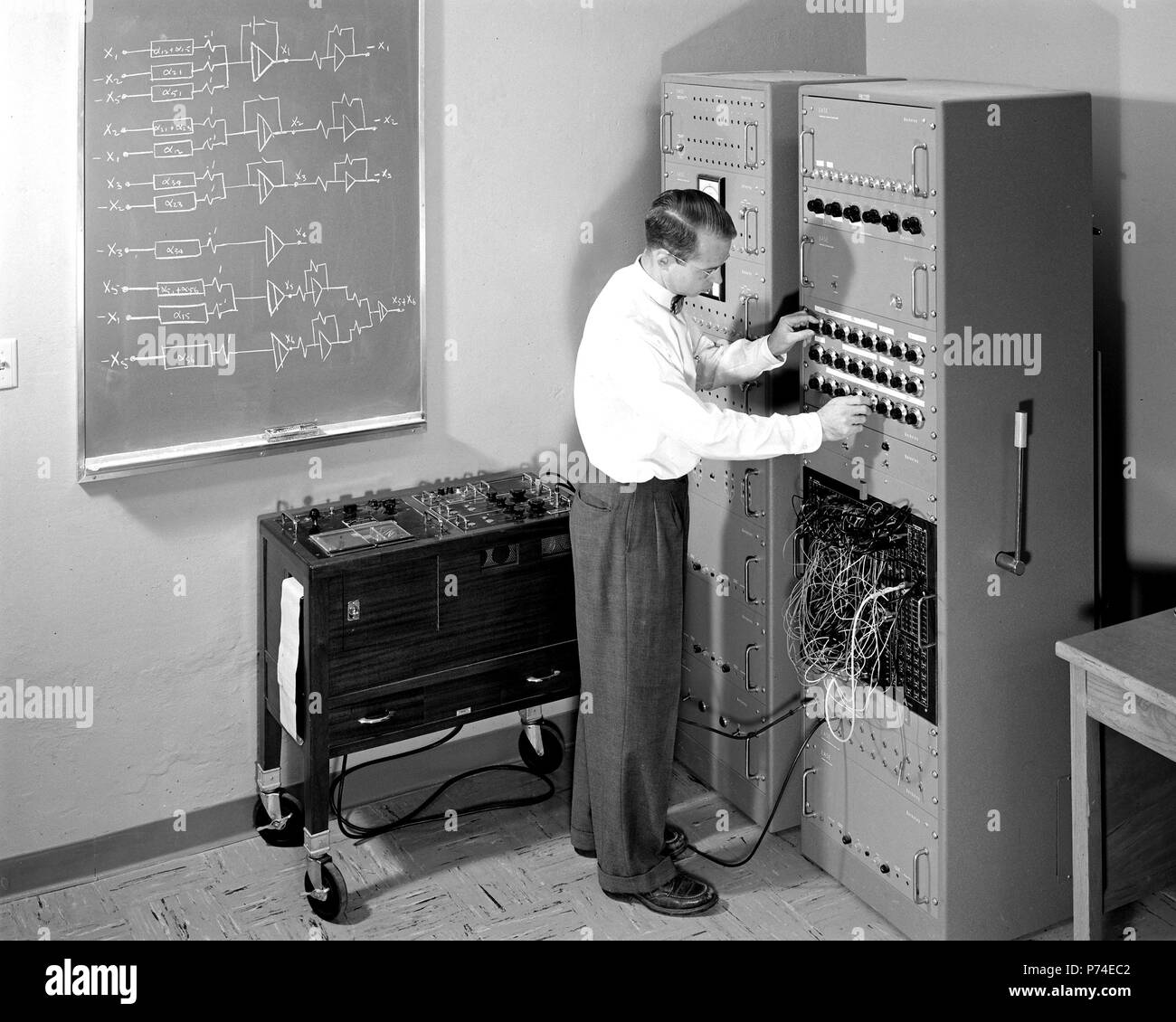 Ellis Myers with Berkeley E.A.S.E. computer. Photograph taken October 18, 1956 Stock Photo
