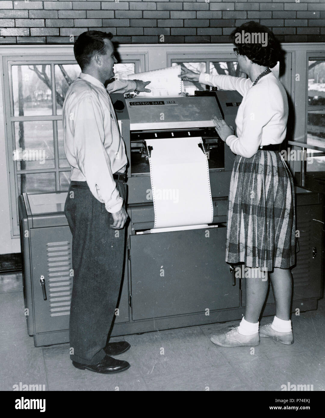 Old computer and printout 1963 Stock Photo