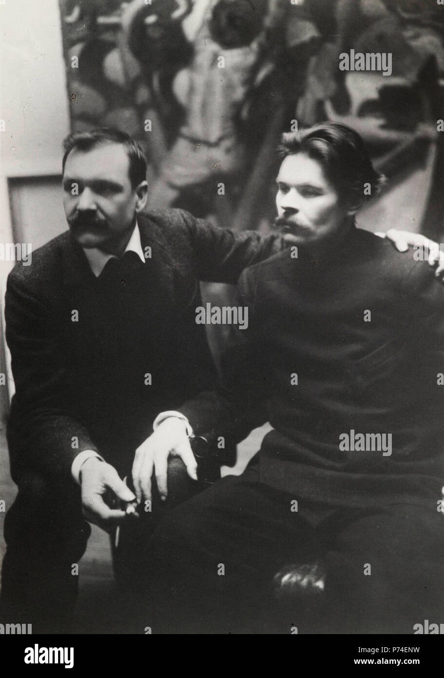 Axel Gallén holding his hand on Maxim Gorky´s shoulder in Gallén´s studio Pirtti in Helsinki, 1905 Stock Photo