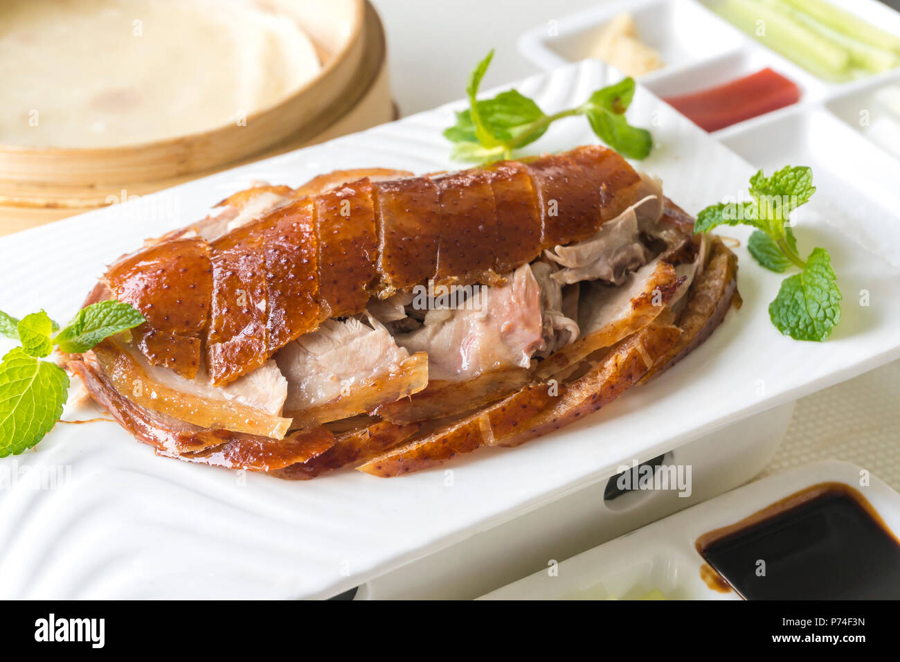 Enjoying roasted Peking duck Stock Photo