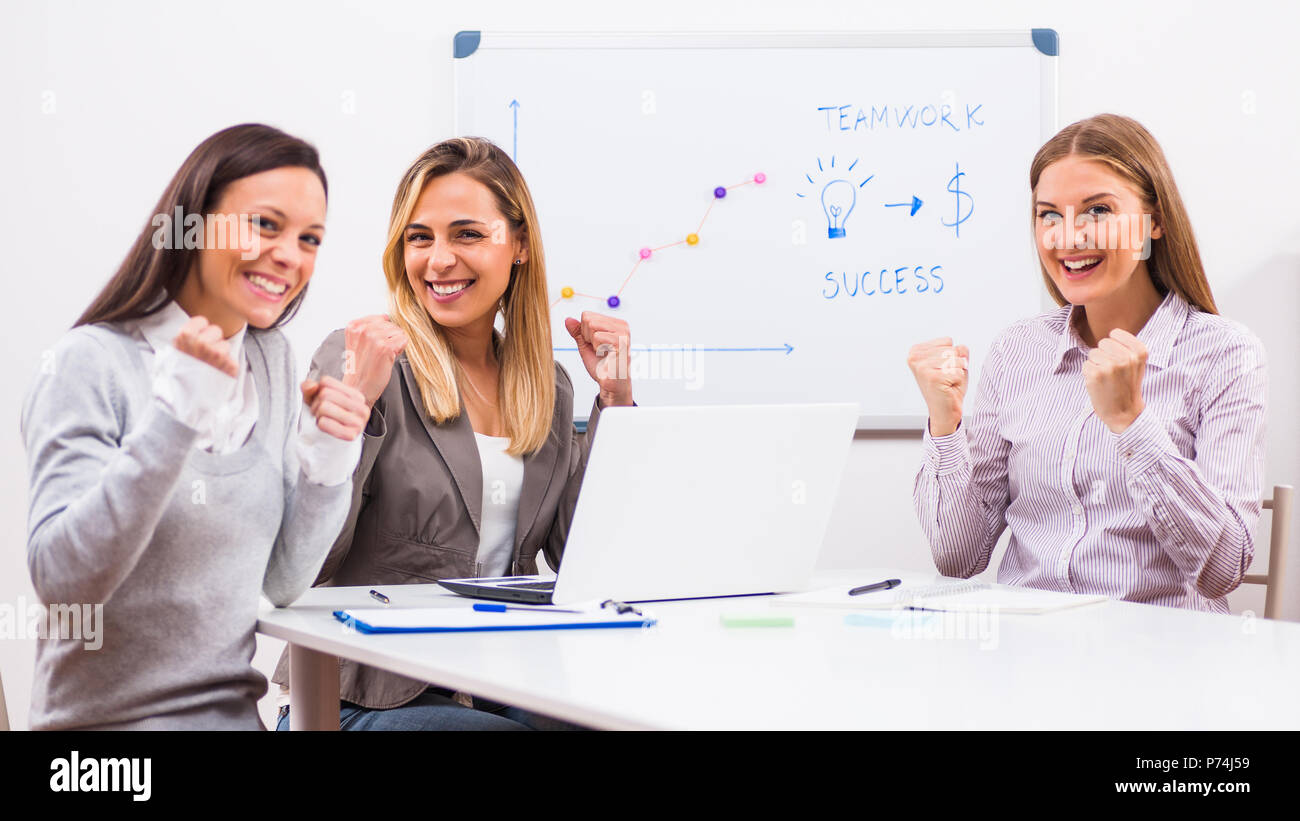 Three businesswomen are having meeting in their office Stock Photo - Alamy