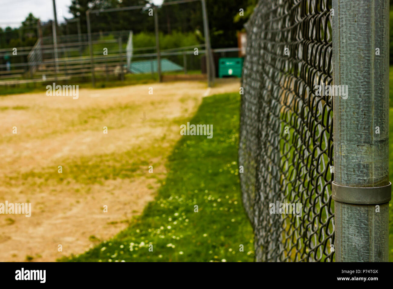 fencing along baseball diamond at park Stock Photo - Alamy