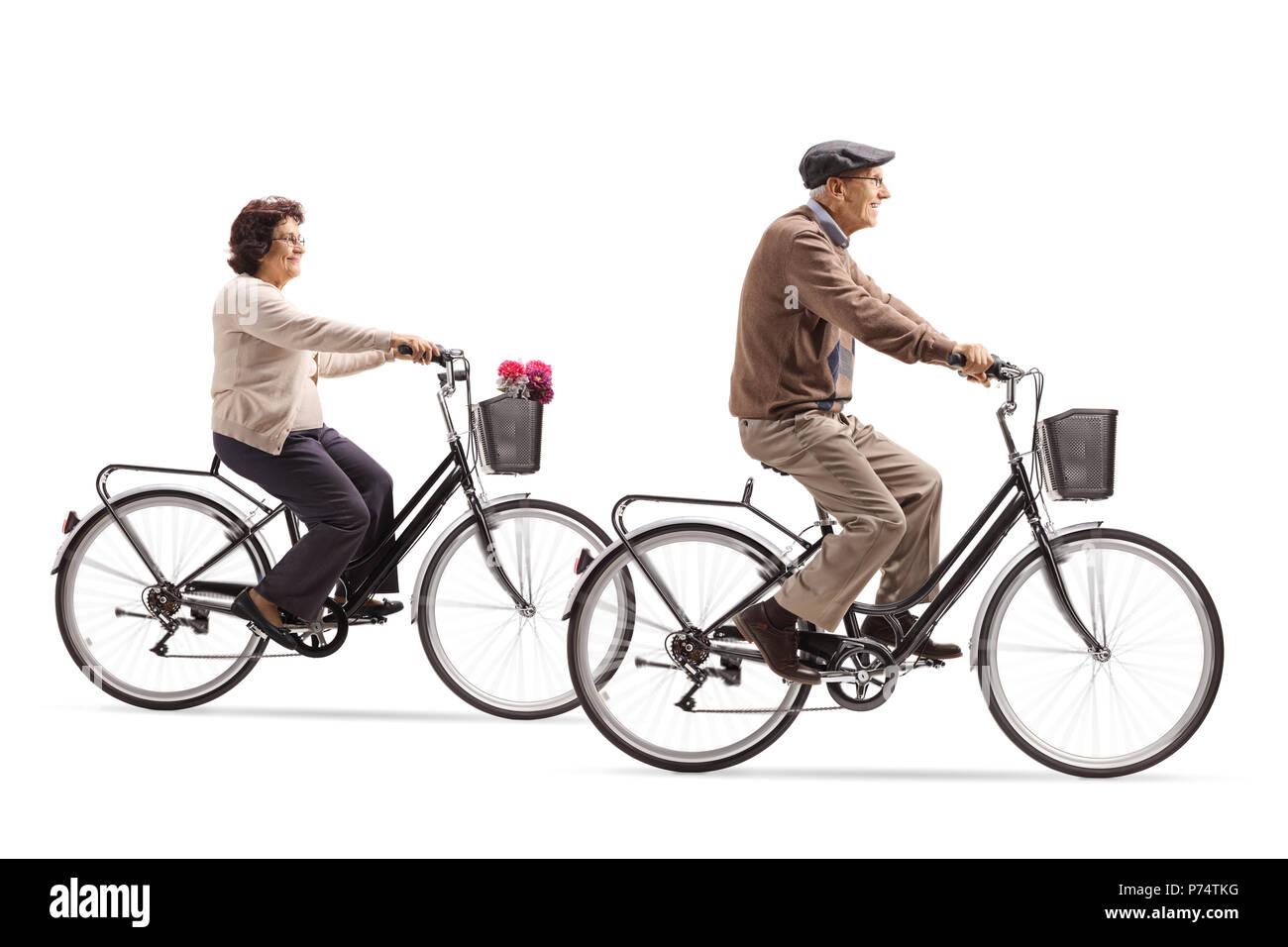 Elderly woman and an elderly man riding bicycles isolated on white background Stock Photo