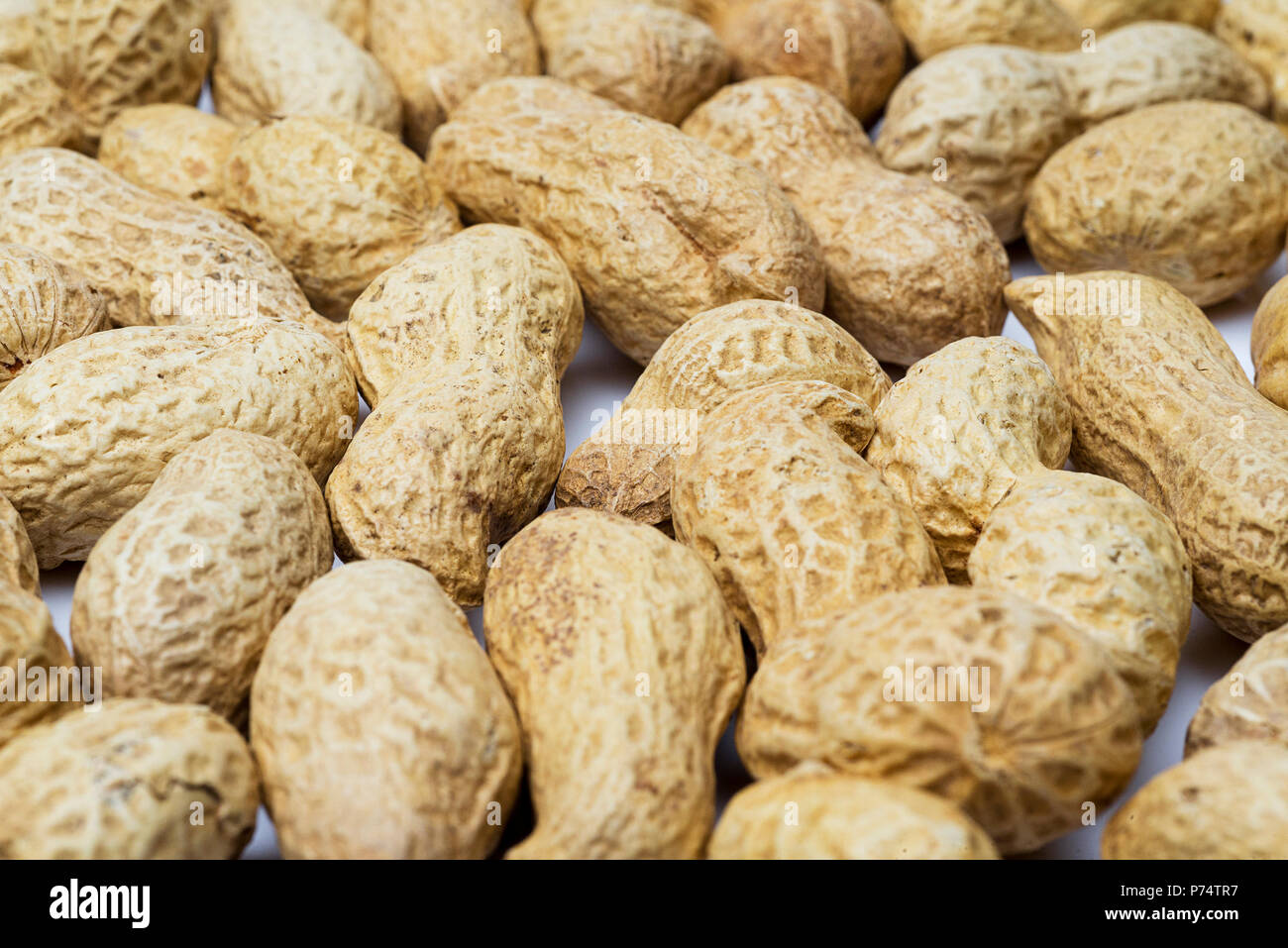 Peanut in the shell close up like a background Stock Photo Alamy