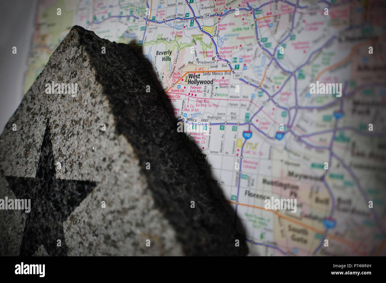A Hollywood star pictured with a map of Hollywood, California Stock