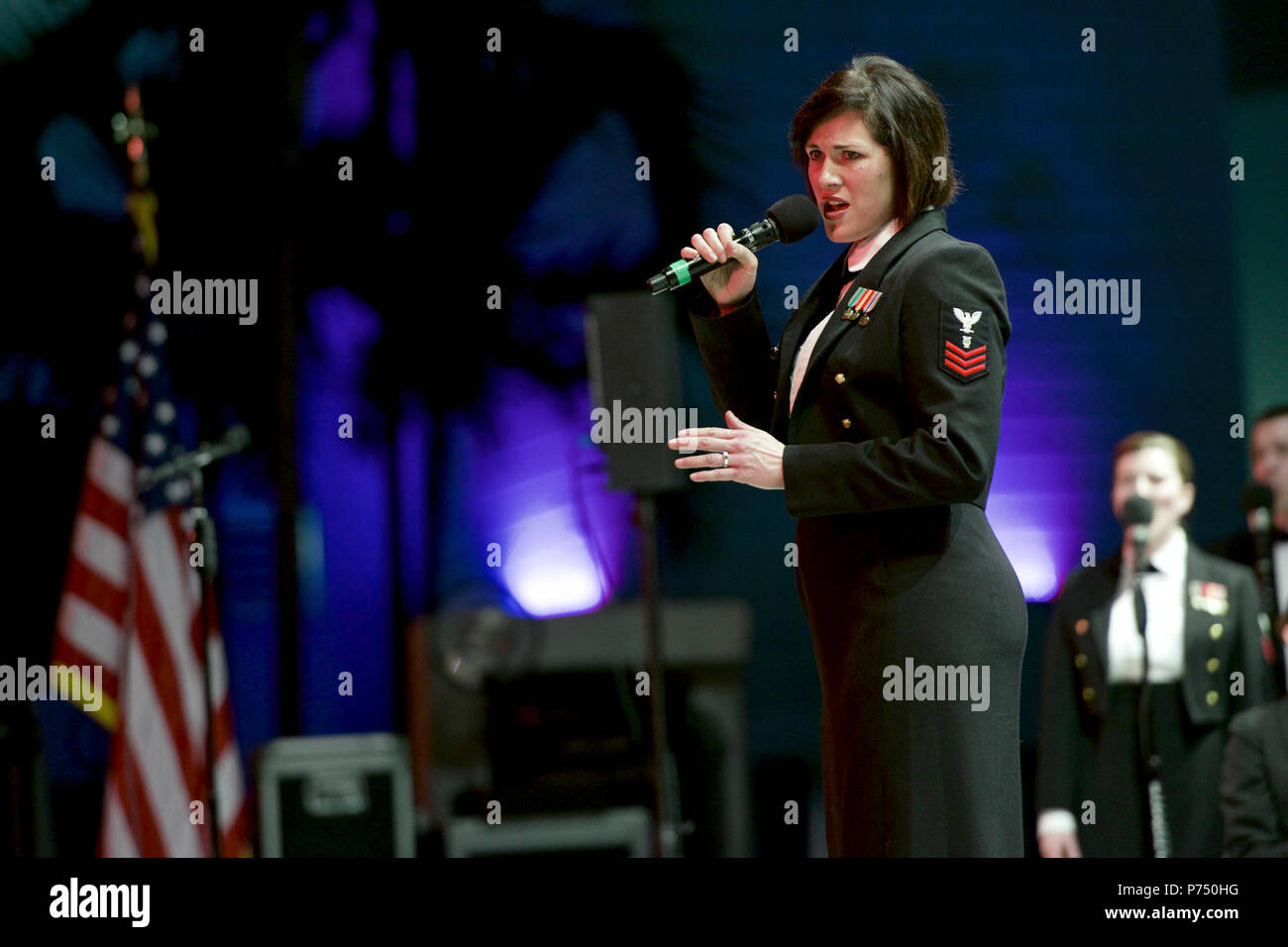 HOLLYWOOD, Fla. (March 1, 2015) Musician 1st Class Maia Rodriguez, of Cleveland, Ohio, performs with the U.S. Navy Band at the ArtsPark Amphitheater in Hollywood, Fla. The U.S. Navy Band is touring the Southeast United States, with performances in 32 cities. Stock Photo