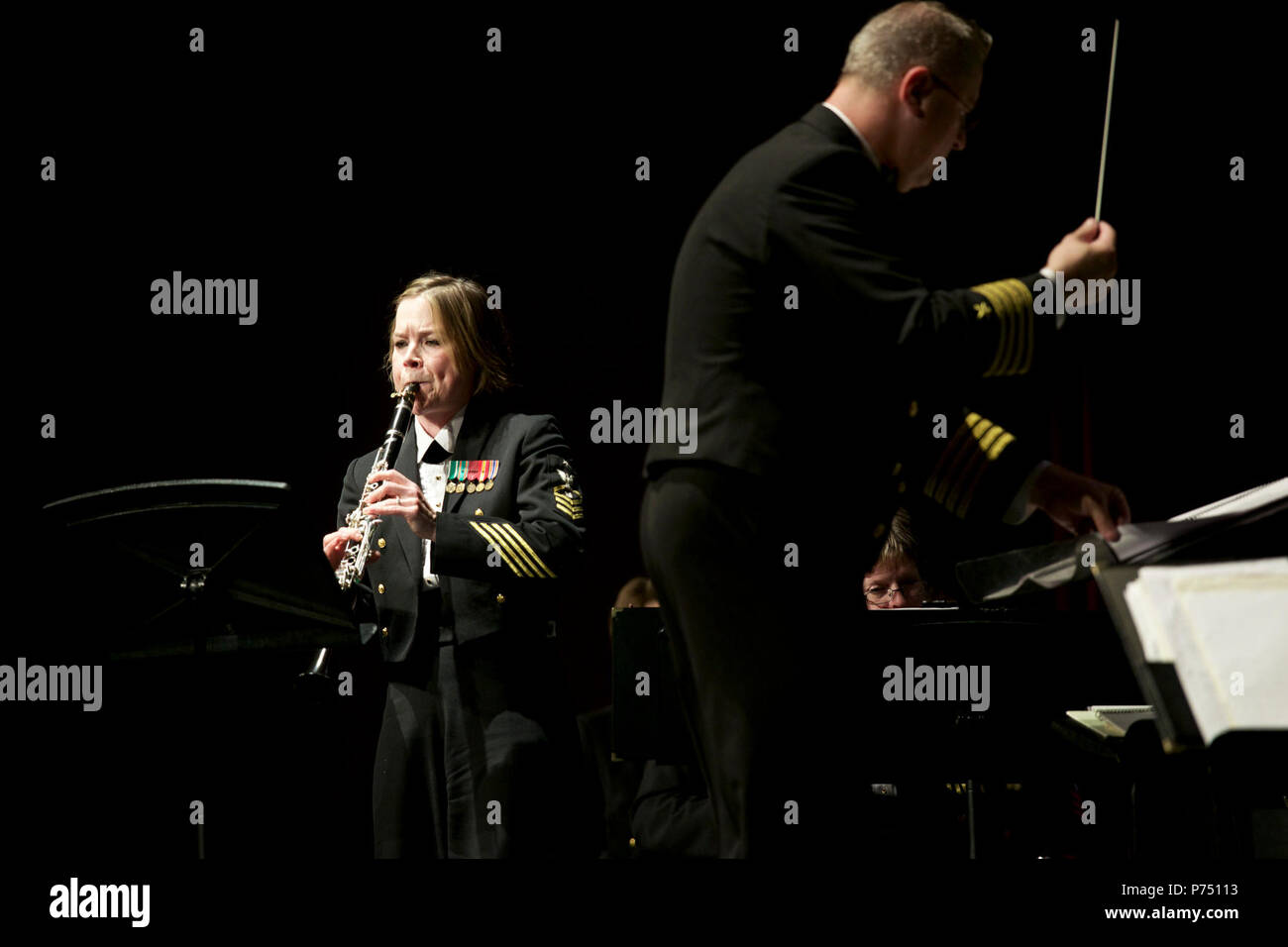 NORTH CHARLESTON, S.C. (March 9, 2015) Senior Chief Musician Laura Grantier, from Denham Springs, La., performs with the U.S. Navy Band during a concert at the Rose Maree Meyers Theater for the Performing Arts in North Charleston, S.C. The U.S. Navy Band is touring the Southeast United States, with performances in 32 cities. Stock Photo