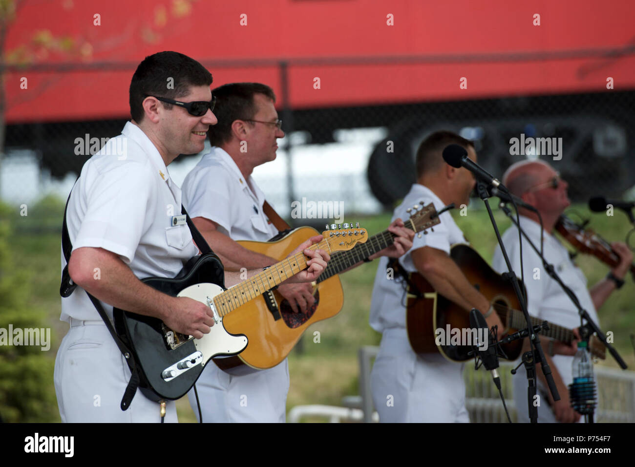 ST. PAUL, Minn. (Sept. 1, 2015) Musician 1st Class Joe Friedman, left, performs with the U.S. Navy Band Country Current at the Minnesota State Fair in St. Paul, Minn. The Navy Band's tour featured 14 performances in six states, reaching out to communities that don't normally see the Navy at work. Stock Photo
