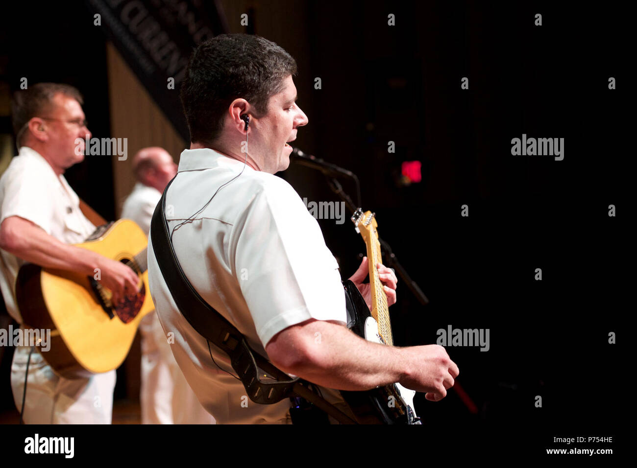 ABERDEEN, S.D. (Sept. 4, 2015) Musician 1st Class Joe Friedman performs with the U.S. Navy Band Country Current at the Aberdeen Civic Theater in Aberdeen, S.D. The Navy Band's tour featured 14 performances in six states, reaching out to communities that don't normally see the Navy at work. Stock Photo
