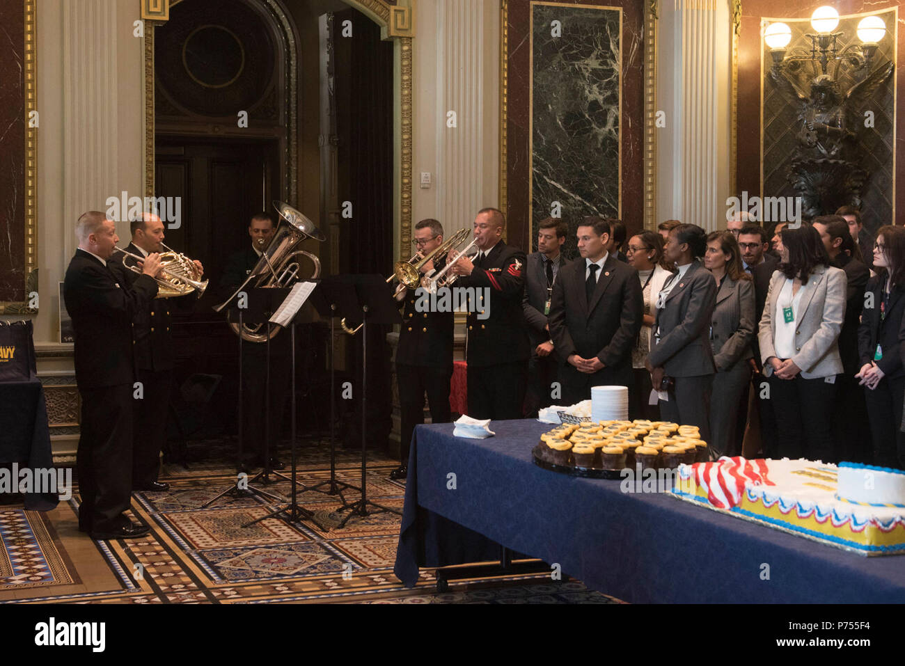 WASHINGTON, D.C. (October 13, 2015)Navy Band Brass Quintet performs 'American's We' during the Navy Birthday cake cutting ceremony celebrating the Navy's 240th birthday. The ceremony was held in the Indian Treaty Room loacated in the East Wing of the Eisenhower Executive Office Building in Washington D.C. Stock Photo