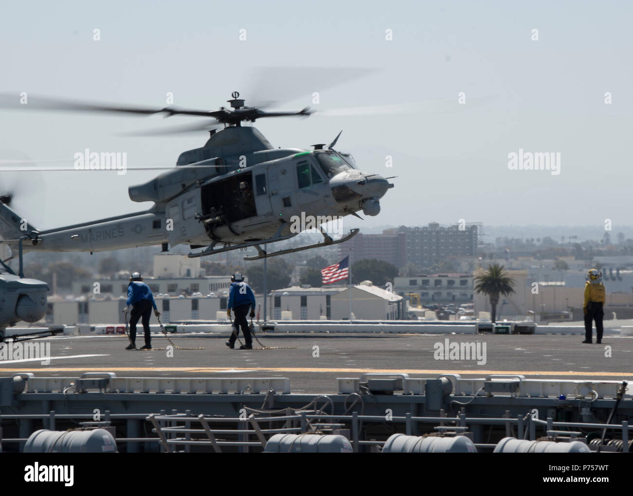 180628-N-XK809-233 United States (June 28, 2018) An AH-1Z Viper, assigned to Marine Light Attack Helicopter Squadron (HMLA) 367, lands on the flight deck of the amphibious assault ship USS Bonhomme Richard (LHD 6) during the squadron embarkation. Bonhomme Richard is currently in its homeport of San Diego, preparing for an upcoming scheduled deployment. (U.S. Navy photo by Mass Communication Specialist 2nd Class William Sykes) Stock Photo