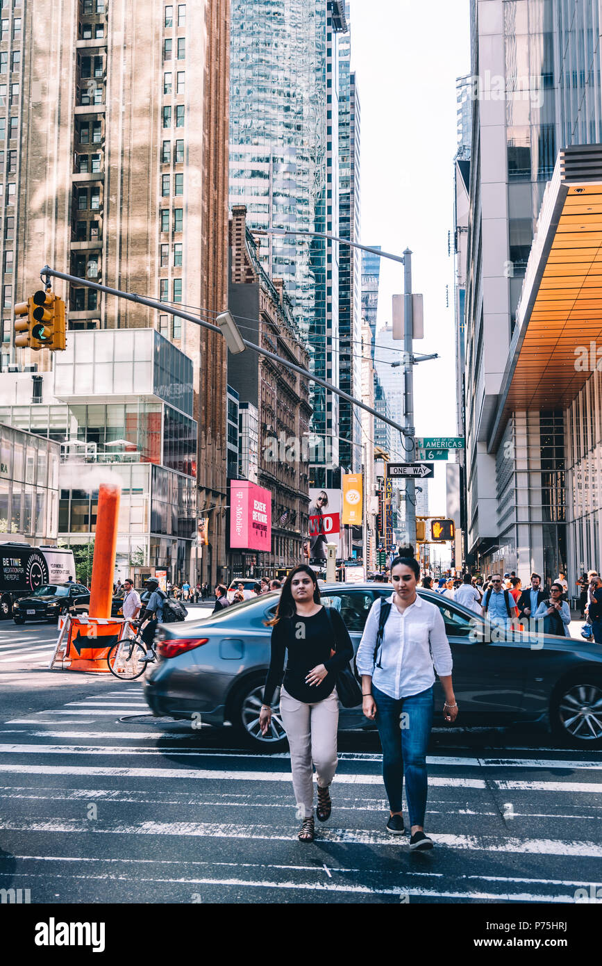 New York City, USA June 20, 2018 Street scene with people crossing