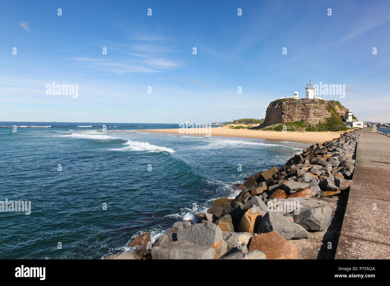 Nobbys Lighthouse is one of Newcastle's most famous landmarks. The lighthouse dates from the 19th century and was the third lighthouse constructed in  Stock Photo